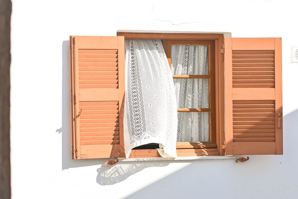 Plantation Shutters vs Curtains for Insulation: Which Keeps Your Home Warmer? | Lafayette Shutters